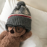 pompon Nordic knit cap