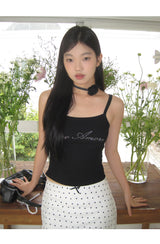 Marshmallow beaded black sleeveless top