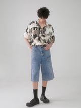 Cuban-style loose and breathable short-sleeved shirt with black and white portrait blur print.