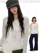 BETWEENAND ミュージックノート ローズプリント ロングスリーブTシャツ