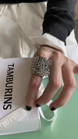 Bold silver line ball tassel ring