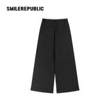 ブラック ウール混 ダブルウエスト プリーツ ワイドレッグ カフパンツ レディース