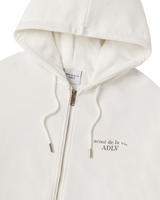 25FW ベーシックロゴナッピングフーディージップアップ クリーム