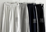 ポルティ 86 ナンバリング3ライントラックワイドパンツ