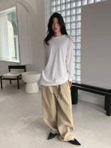 CURVED TUCK COTTON TROUSER