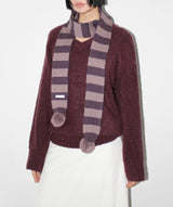 REVERSIBLE POM MUFFLER