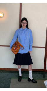 プリーツステディミディスカート