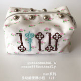floral-embroidered pouch