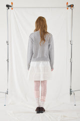 Rough damaged cardigan