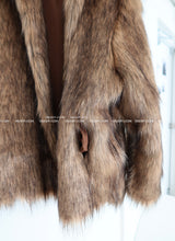 High-quality hooded fake fur jacket