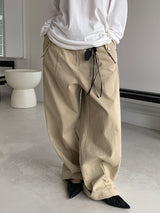 CURVED TUCK COTTON TROUSER
