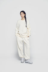 24FW アップサイドダウンロゴナッピングズリーパンツアイボリー