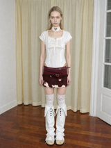 Emoha Stylish Low-Rise Mini Skirt with Glossy Cow-Print Calf Hair Paneling