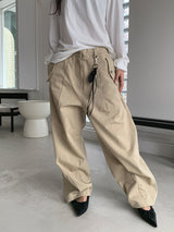 CURVED TUCK COTTON TROUSER