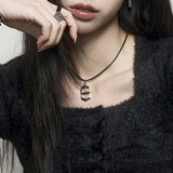 Shield symbol leather necklace