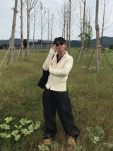リブラインマッスルフィットジップアップニット