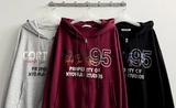 95 レタリングツーウェイフーディドジップアップ