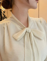Cave Pearl Tie Puff Blouse