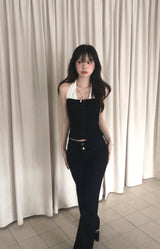 woman in black low button bootcut pt