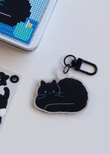 hunched cat keyring