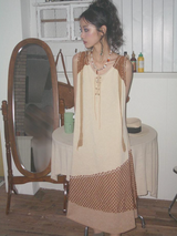 A long, loose and slimming knitted dress for a niche market.