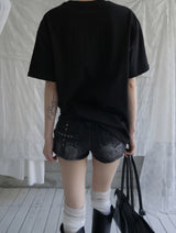 Deconlow studded black denim shorts