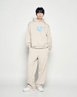25FW ブルーオバールロゴフーディー エッセンシャルベージュ