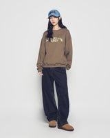 25FW WOMAN アーチシェイプドロゴナッピングスウェットシャツ