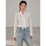 French ribbon tie V-neck blouse