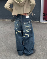 Back damage denim pants