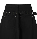 Pale studded strap pants