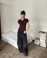 エレムジッパーストリングツーウェイバンディドワイドカーゴパンツ