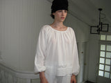 Pale lace blouse