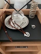 Spiral symbol suede necklace