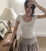 cheek dot flare button midi sk