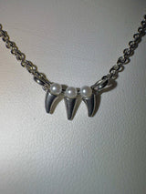 Triple teeth pearl