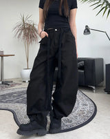 Pale studded strap pants