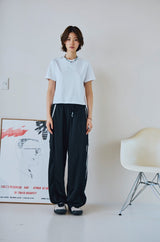 26SS★ Curved Line Track Pants