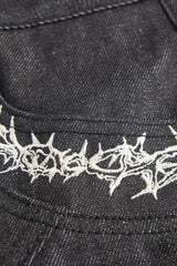 Embroidered Flared Raw Jeans