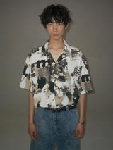 Cuban-style loose and breathable short-sleeved shirt with black and white portrait blur print.