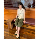 burring sleeveless blouse