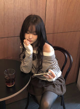 ブーディンボーダールーズフィットオフショルダーボタンニット