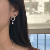 Circle drop earring