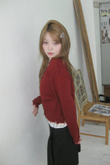 Rough damaged cardigan