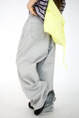 over wide gray pants