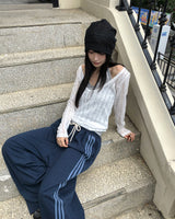 Tida oversized-fit punching see-through long-sleeved knitwear