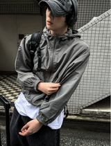 Arc-in-crop windbreaker