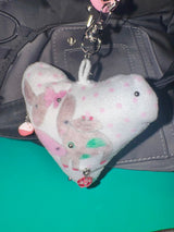 Pierced pinky cow keychain