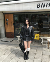 Curved leather jacket