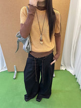 Black high-button-up wide pants
